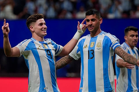  Julian Alvarez celebrates scoring the opening goal 